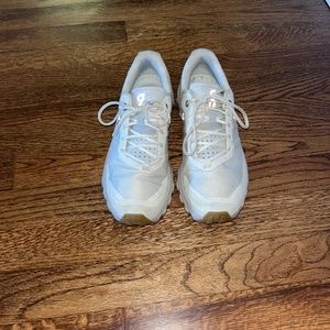 Women on running/cloud sneakers